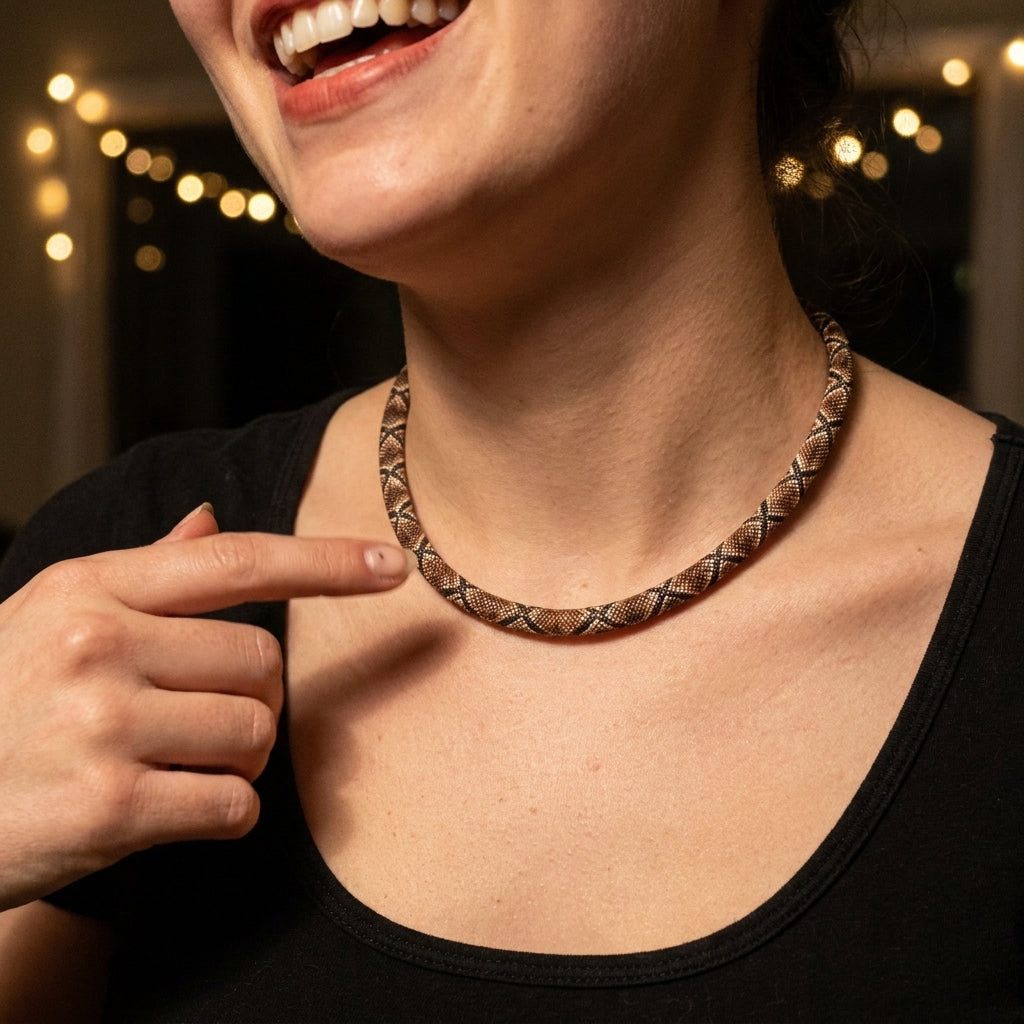 Woman wearing the python-pattern serpent necklace